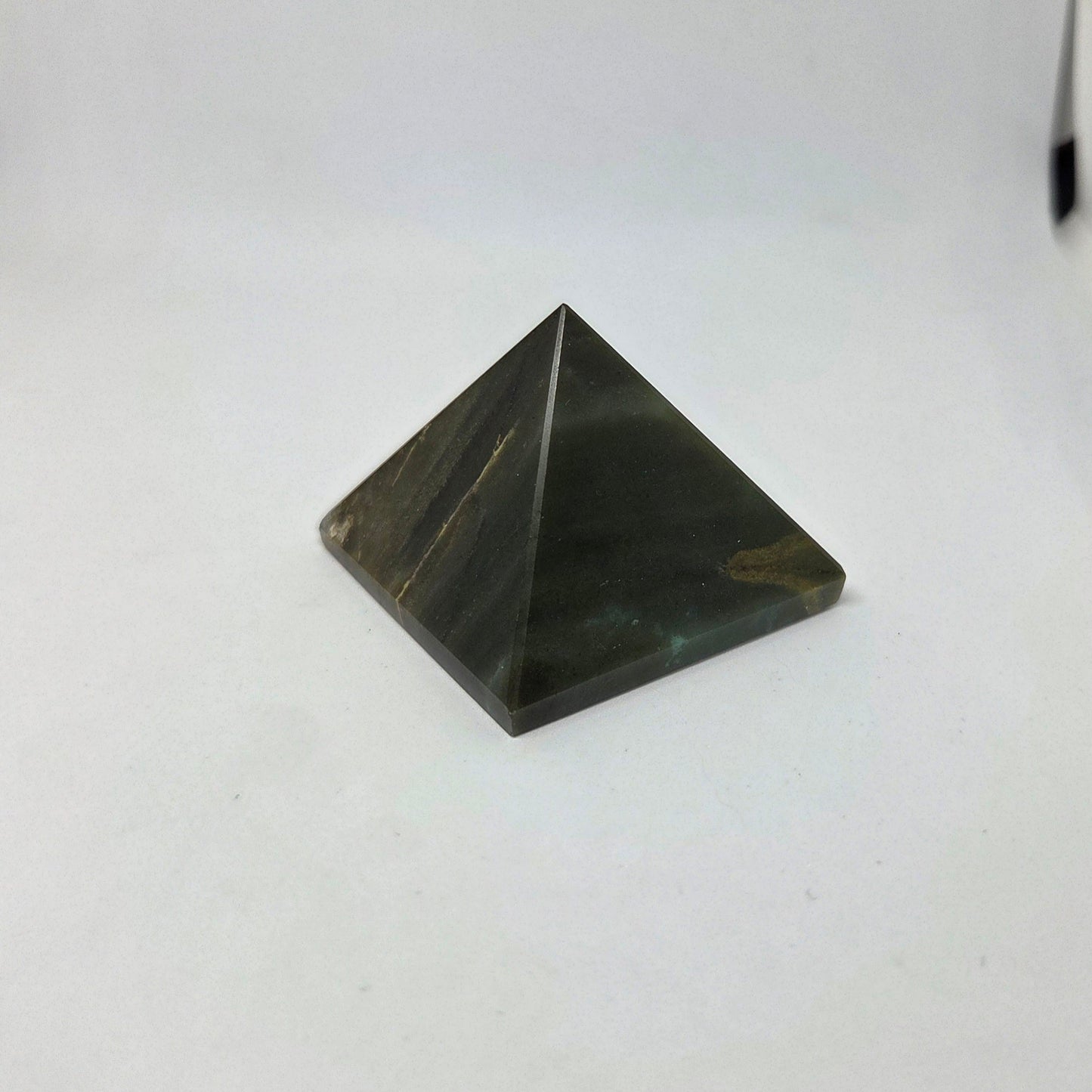 Pyramid-shaped object on a white background