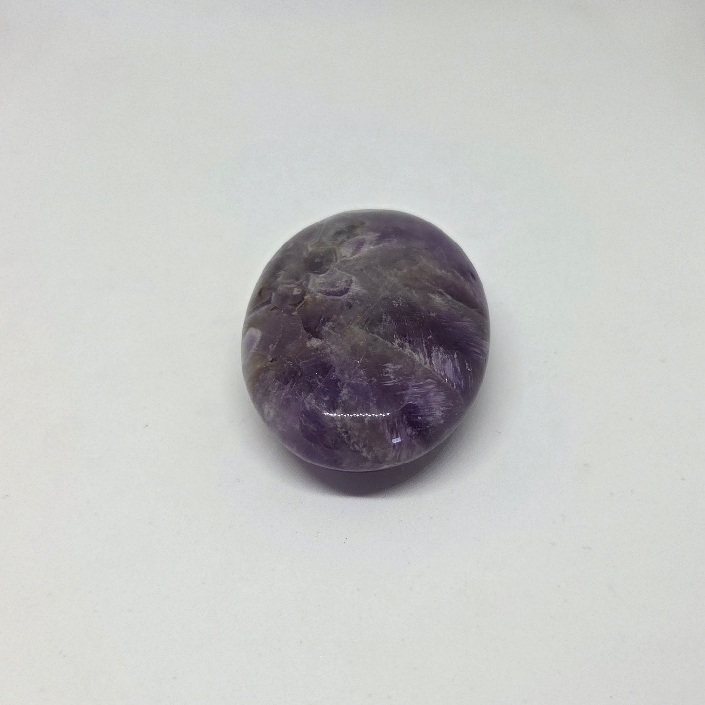 Purple stone on a white background
