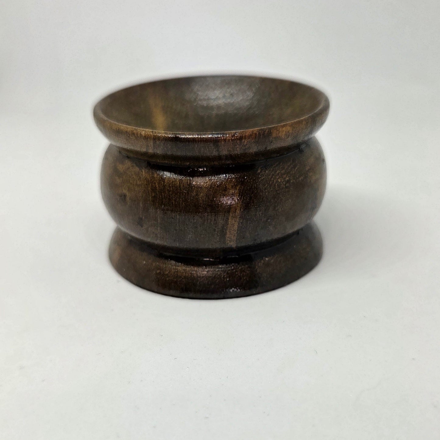 Wooden bowl on a white background