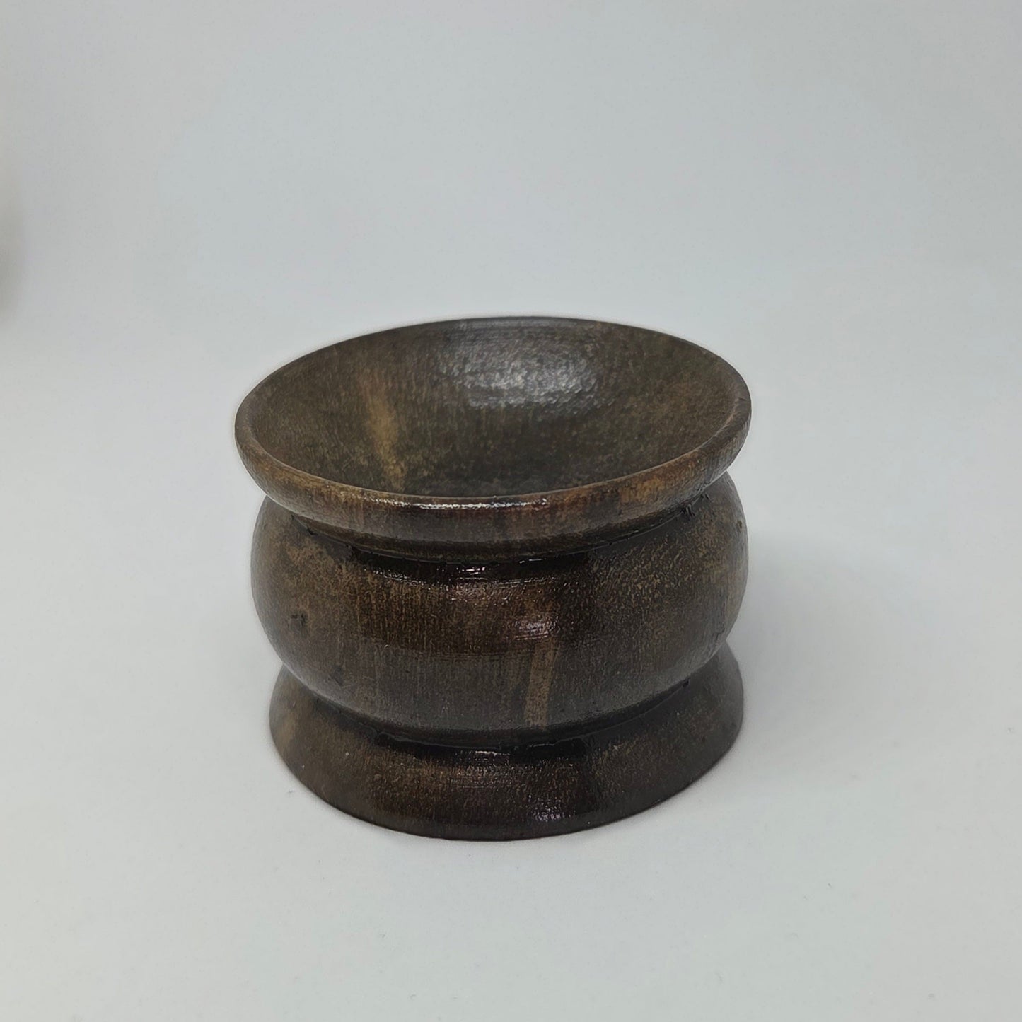 Wooden bowl on a white background