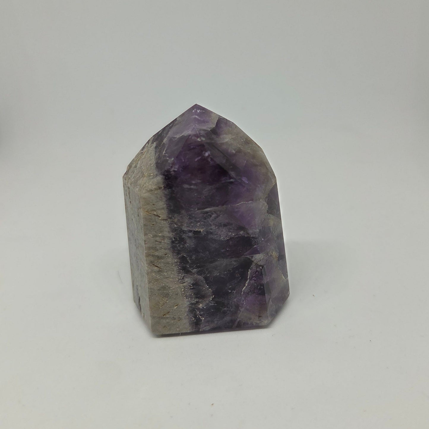 Amethyst crystal on a white background