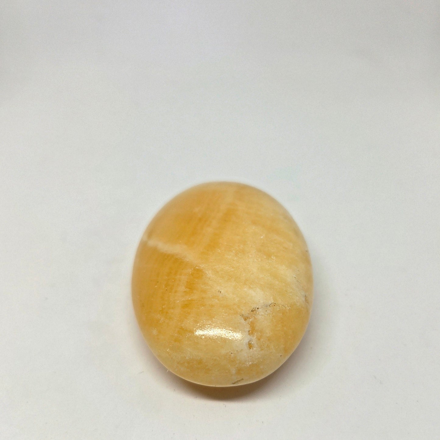 Oval-shaped stone on a white background