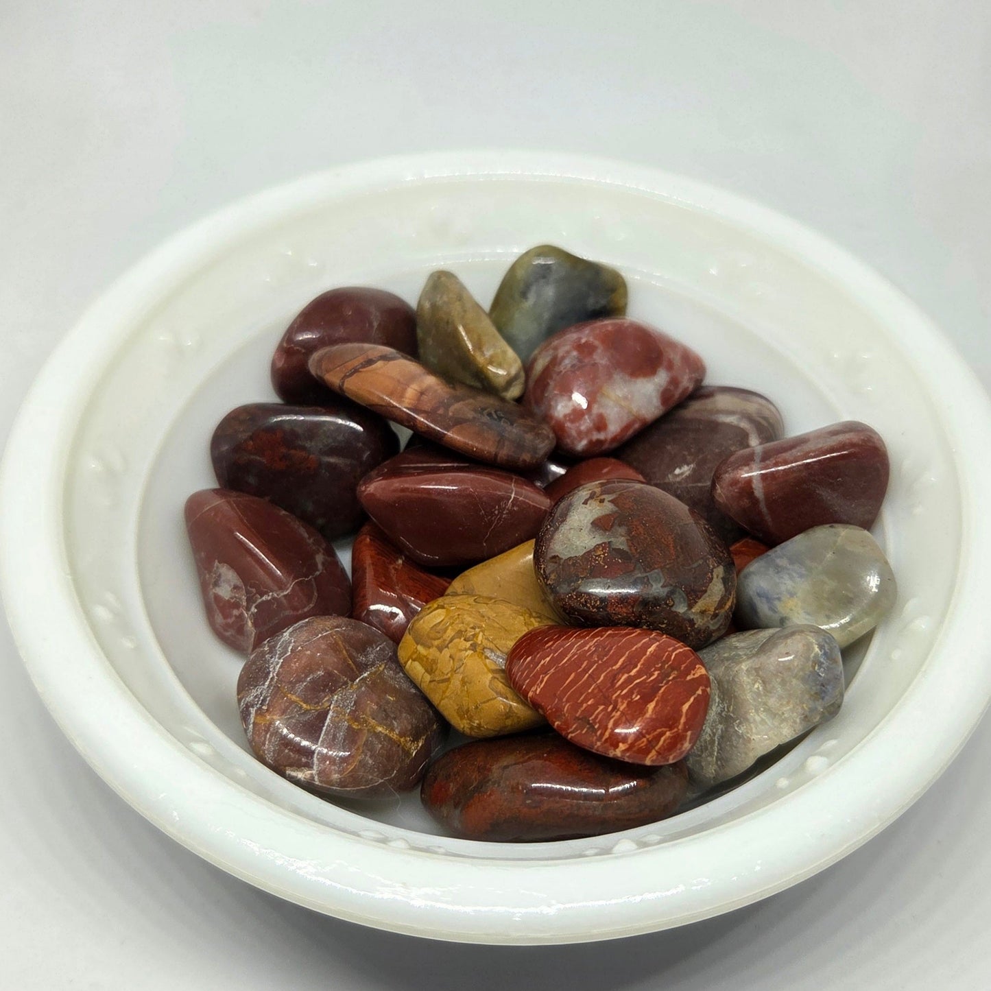 Various colors of Grade A Brazilian Jasper tumbles