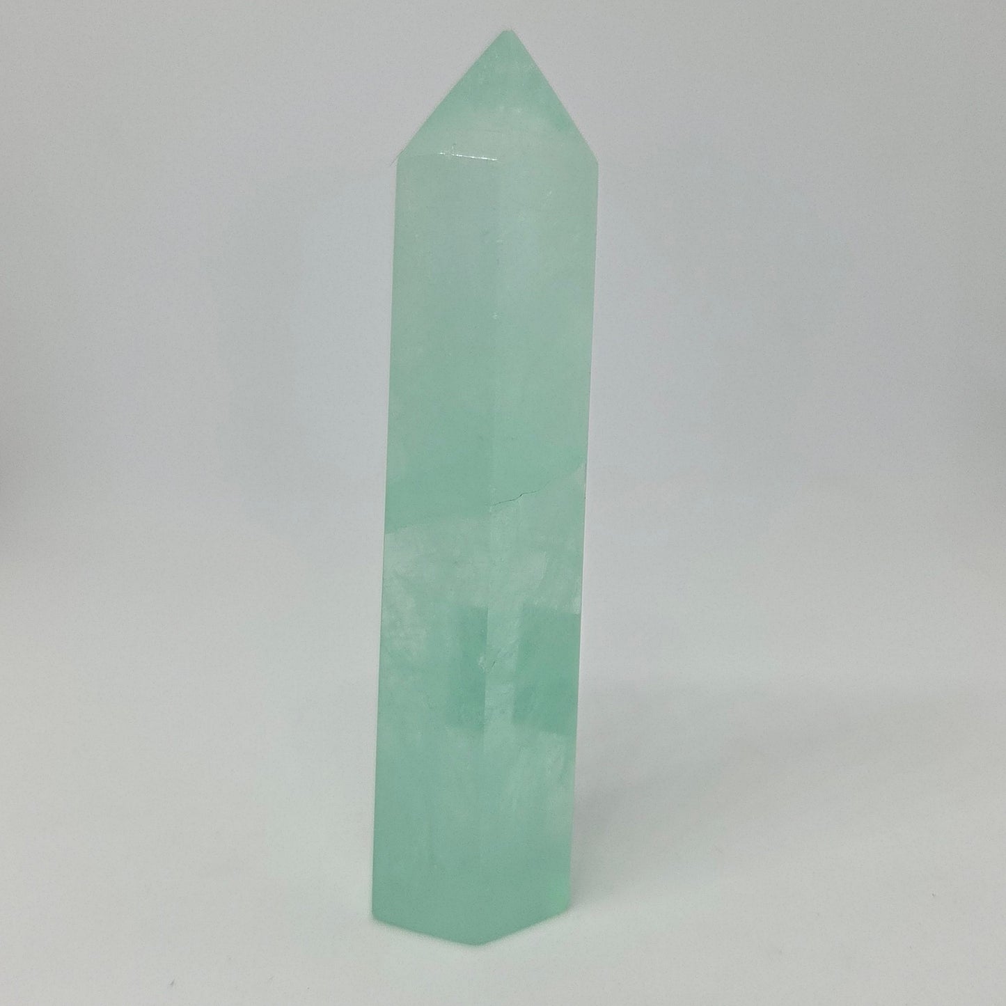 Green Fluorite Tower Healing Crystal standing upright