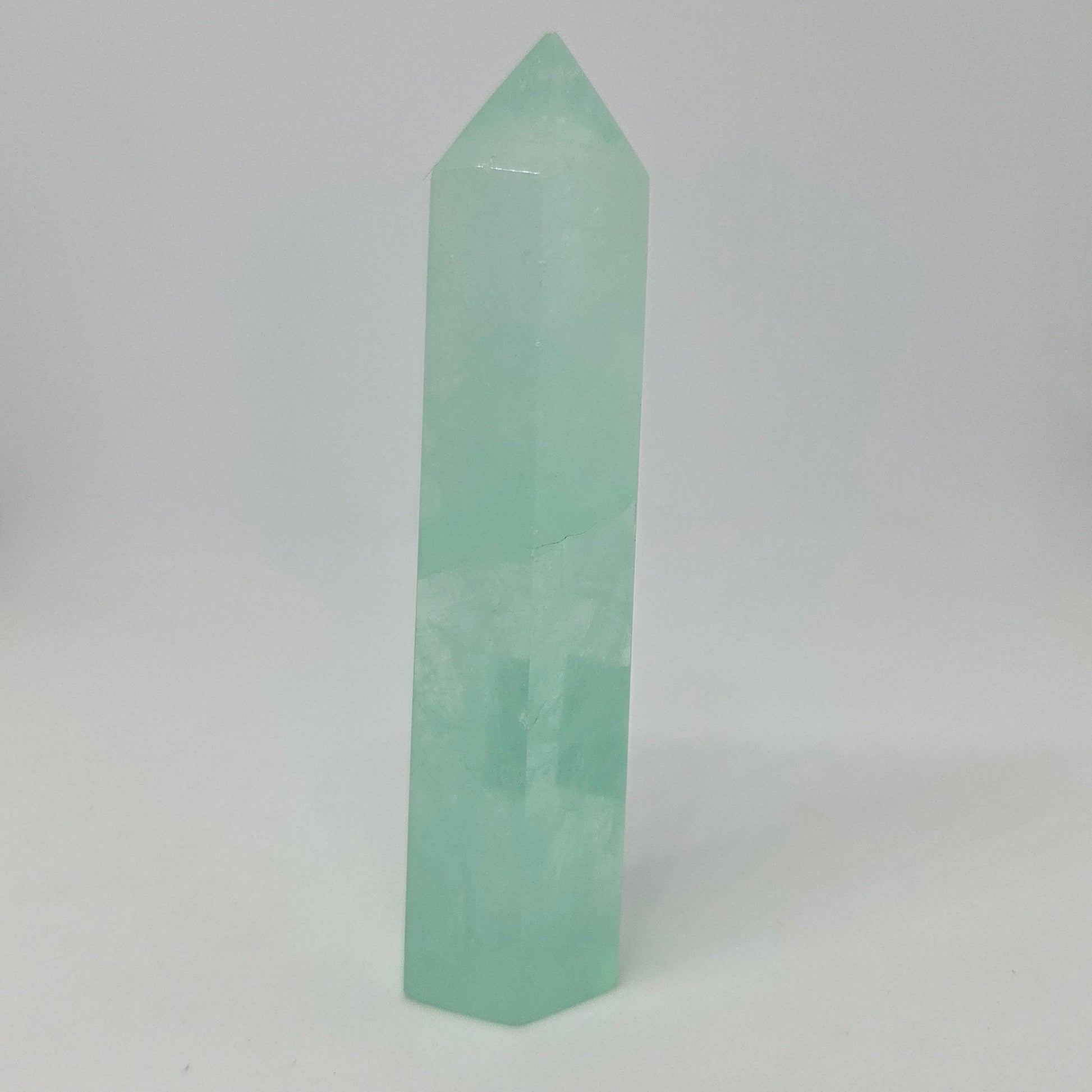 Green Fluorite Tower Healing Crystal standing upright