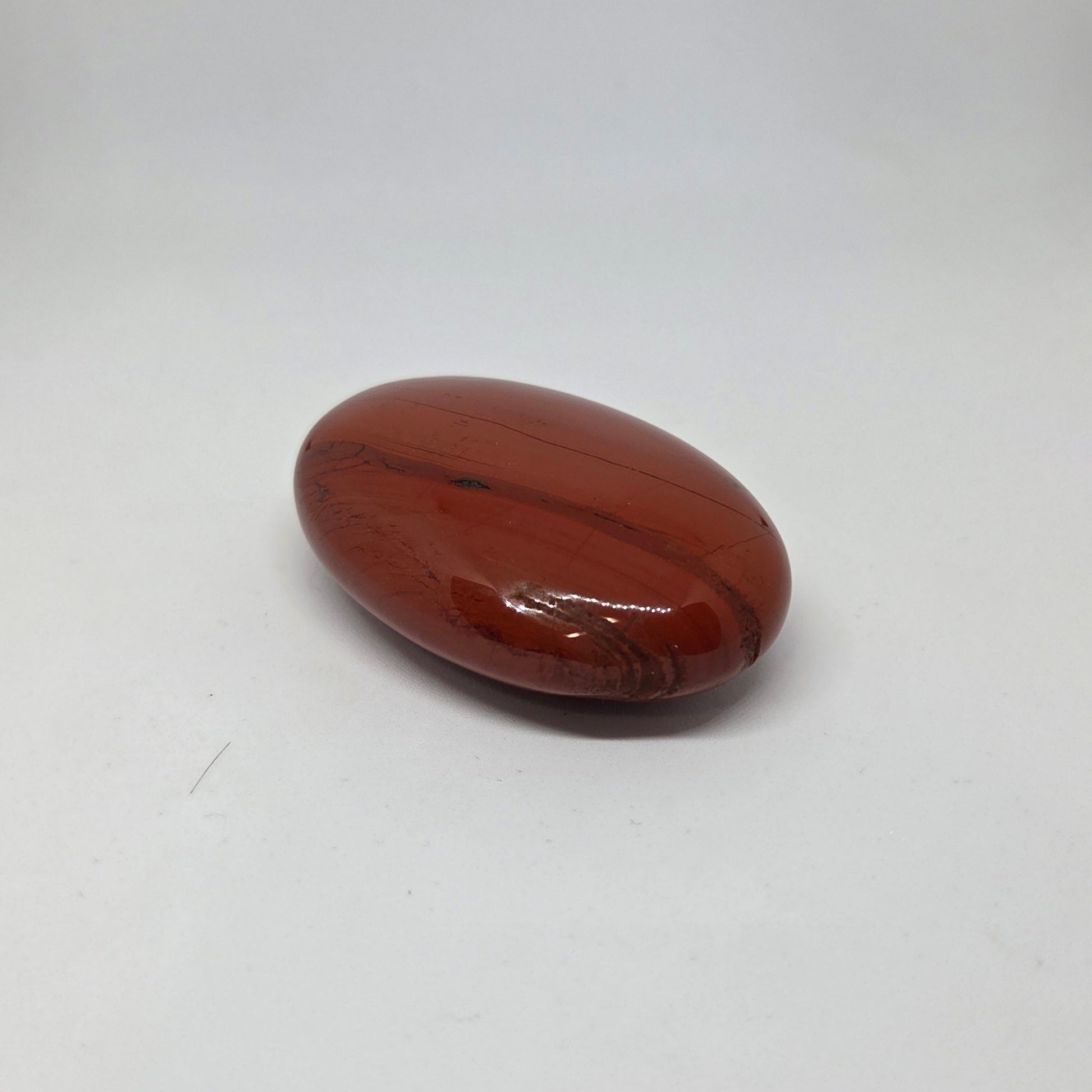Red stone on a white background