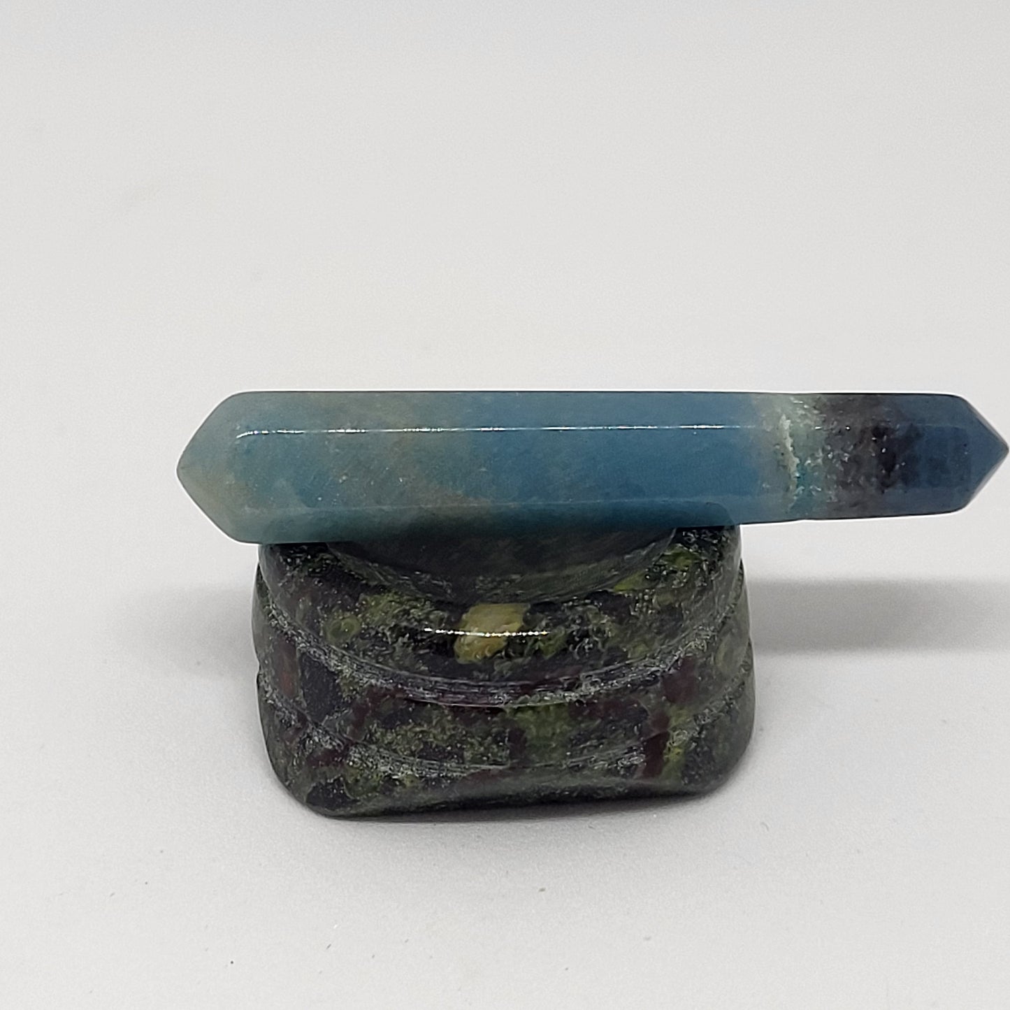 Trollite Crystal Energy Pillar close up on a stand