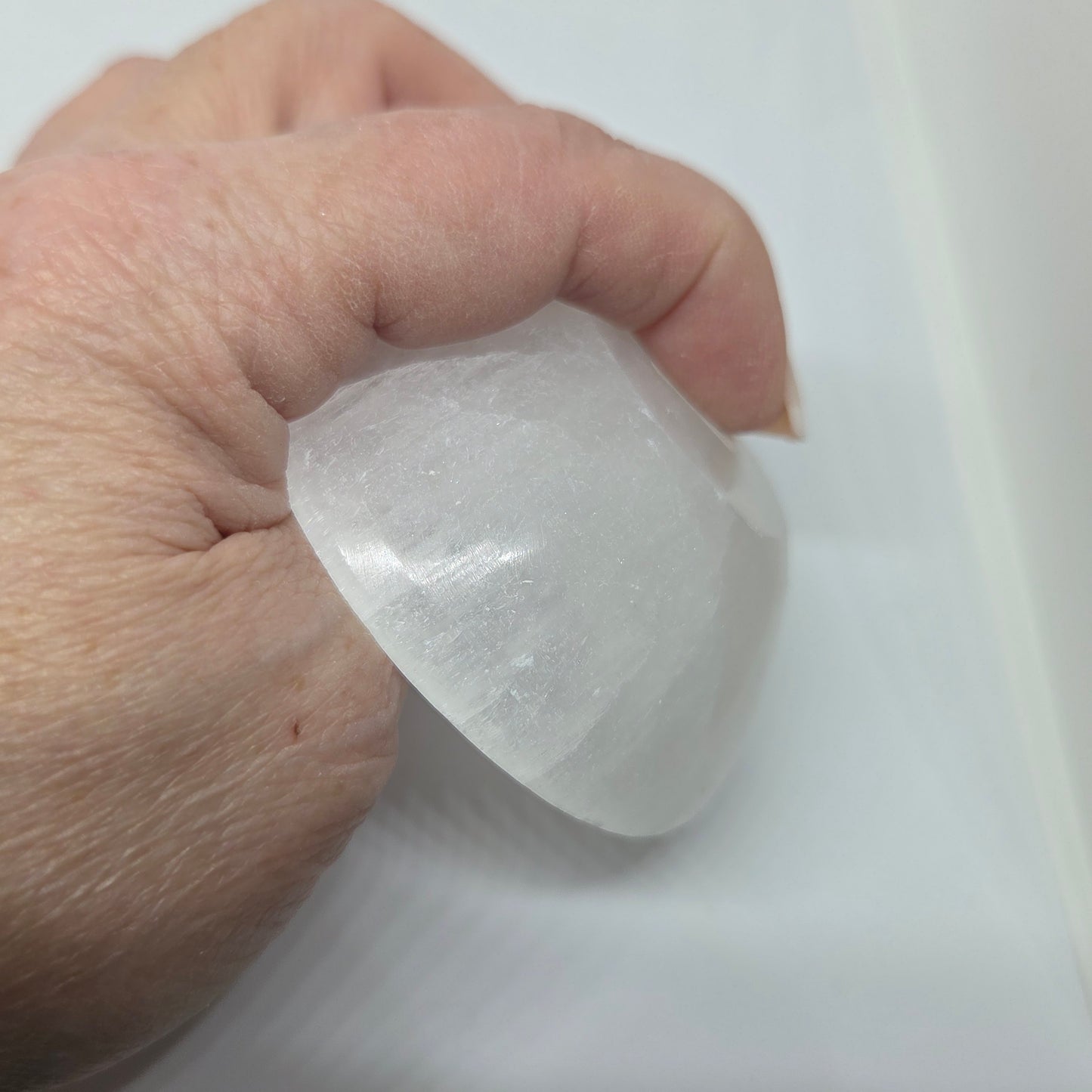 Small Moroccan Selenite Bowl Showing Size and Pearlescent White Glow