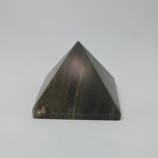 Pyramidal crystal on a white background