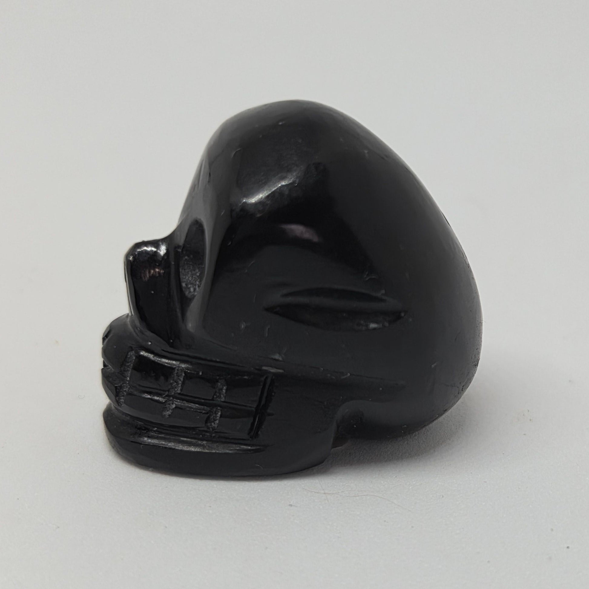 Black boxing glove on a white background
