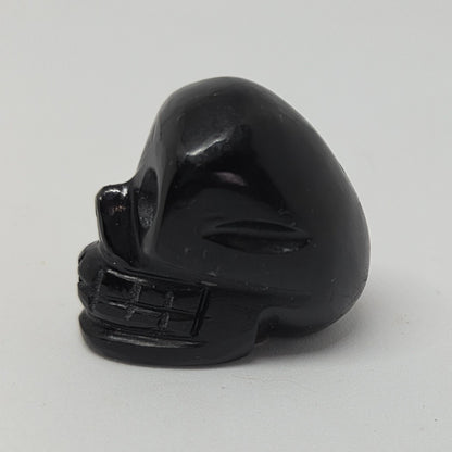 Black boxing glove on a white background