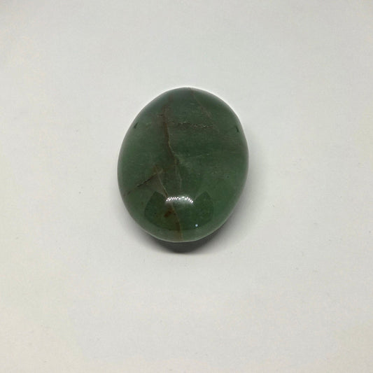 Green stone on a white background