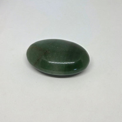 Green stone on a white background