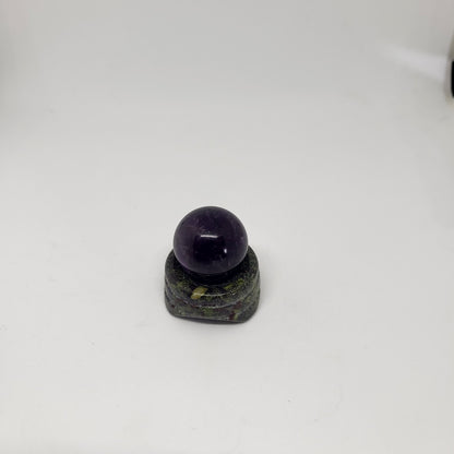 A Blood Jasper sphere stand with a spherical Dragon Blood Jasper on top, displayed against a white background.