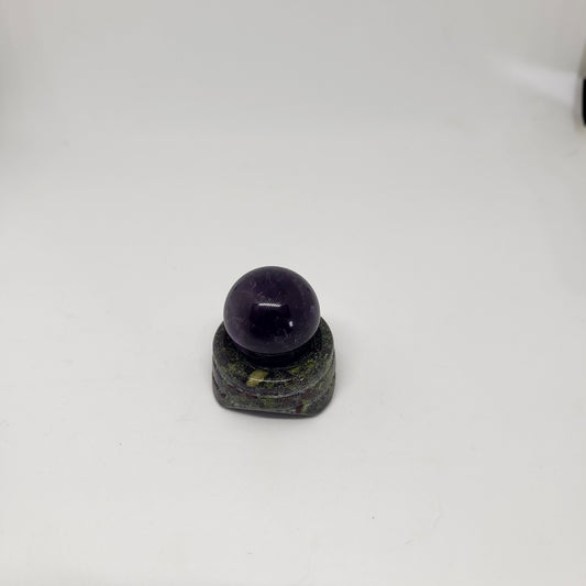 A Blood Jasper sphere stand with a spherical Dragon Blood Jasper on top, displayed against a white background.