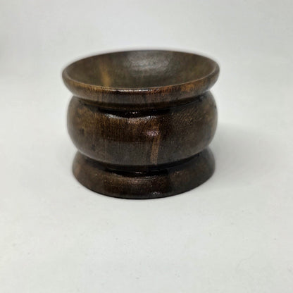 Wooden bowl on a white background