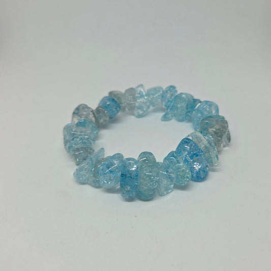 Blue crystal chip bracelet on a white background