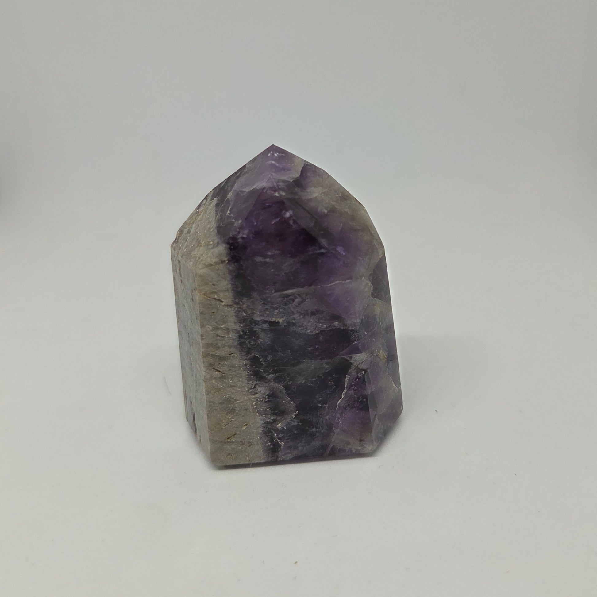 Amethyst crystal on a white background