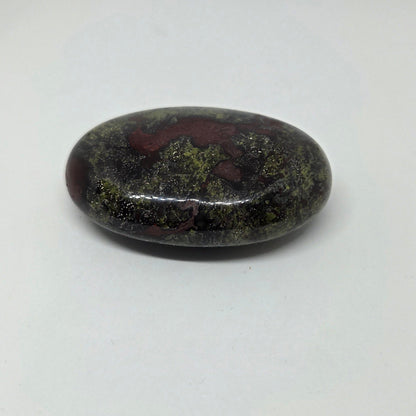 Polished gemstone on a white background