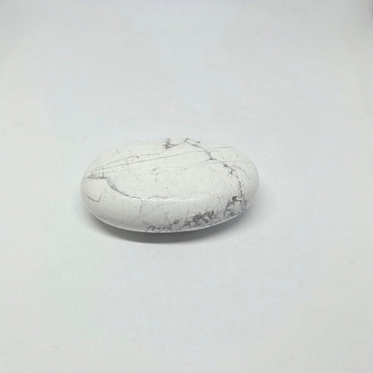 White marble stone on a light gray background