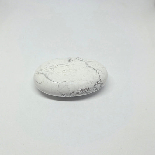 White marble stone on a light gray background