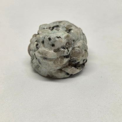 Decorative stone with a unique pattern on a white background
