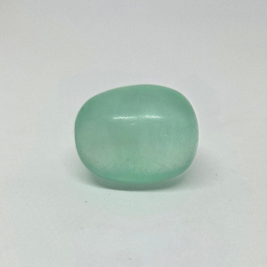 Green Fluorite Energy Crystal Tumble, laying down view