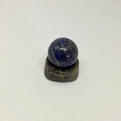 Grey and BlueLapis_Lazuli_Energy Crystal Sphere foreward facing on a stand