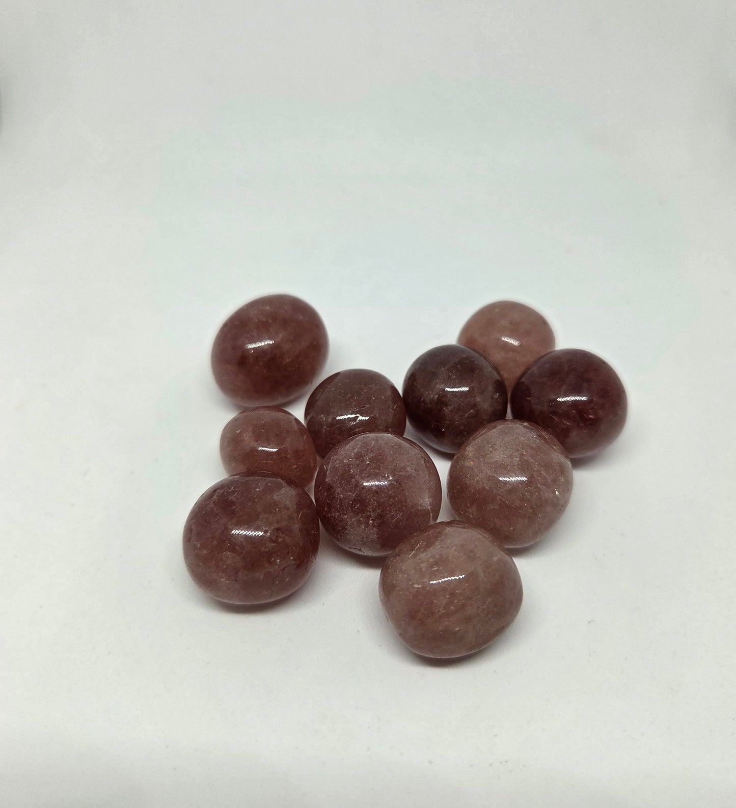 Strawberry Quartz Energy Crystal Tumble grouped together