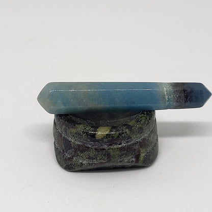 Trollite Crystal Energy Pillar close up on a stand