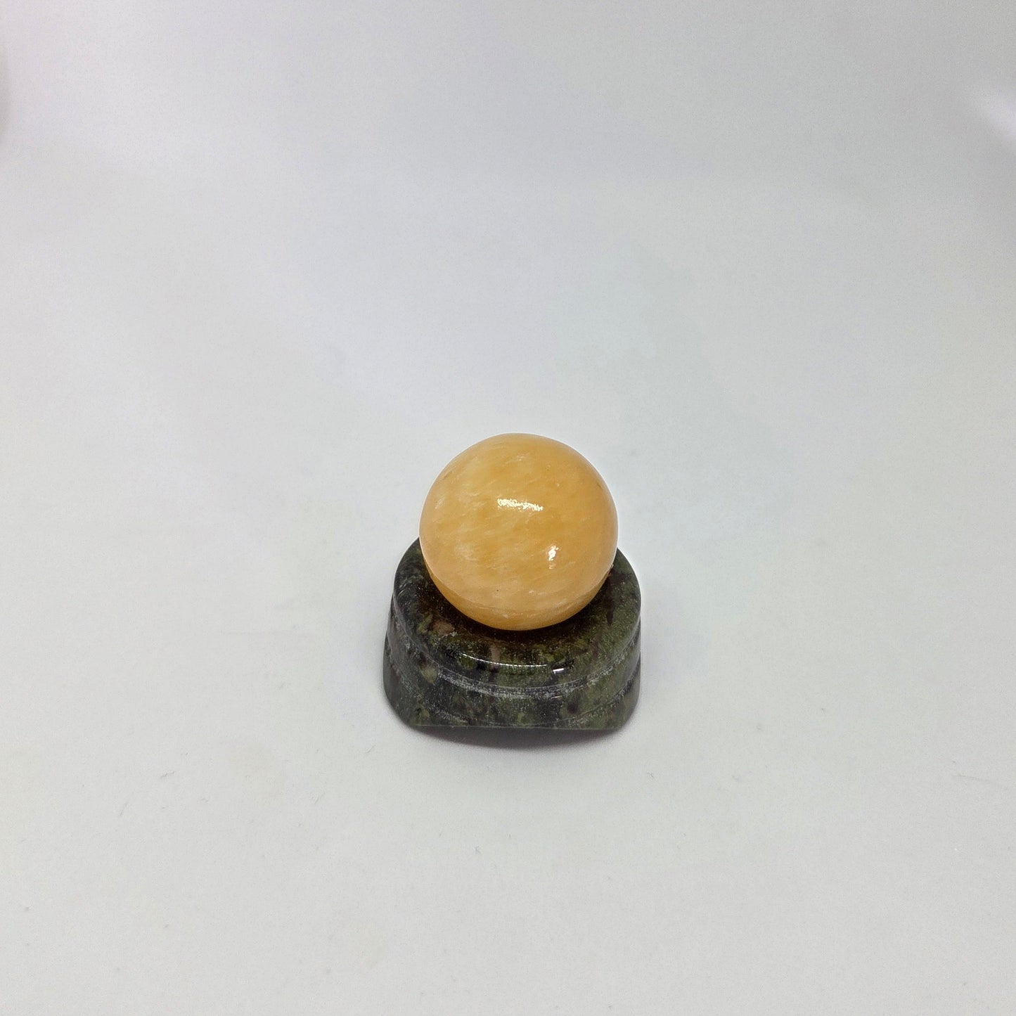 Yellow_Citrine_Calcite_Energy Quartz_Sphere close up leaning to right