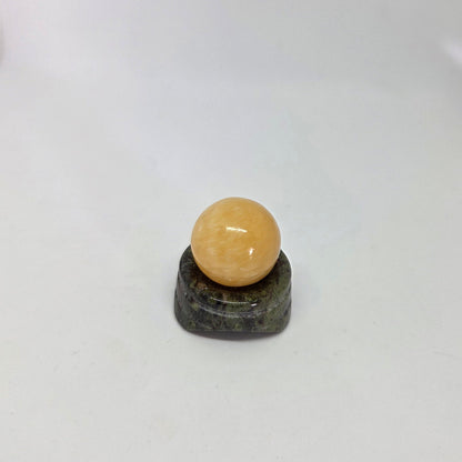 Yellow_Citrine_Calcite_Energy Quartz_Sphere close up leaning to right