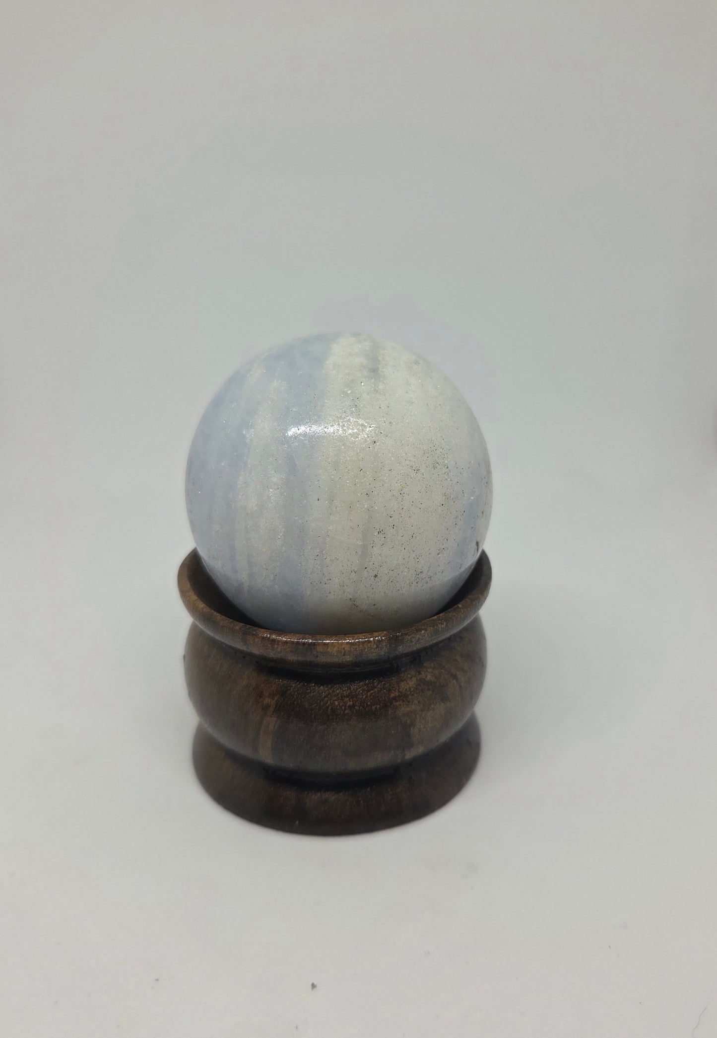 Blue Calcite Sphere Displaying Soft Translucent Blue Coloring